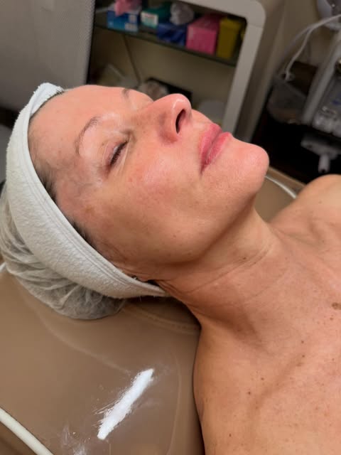 A Marglow client relaxing during a skin treatment